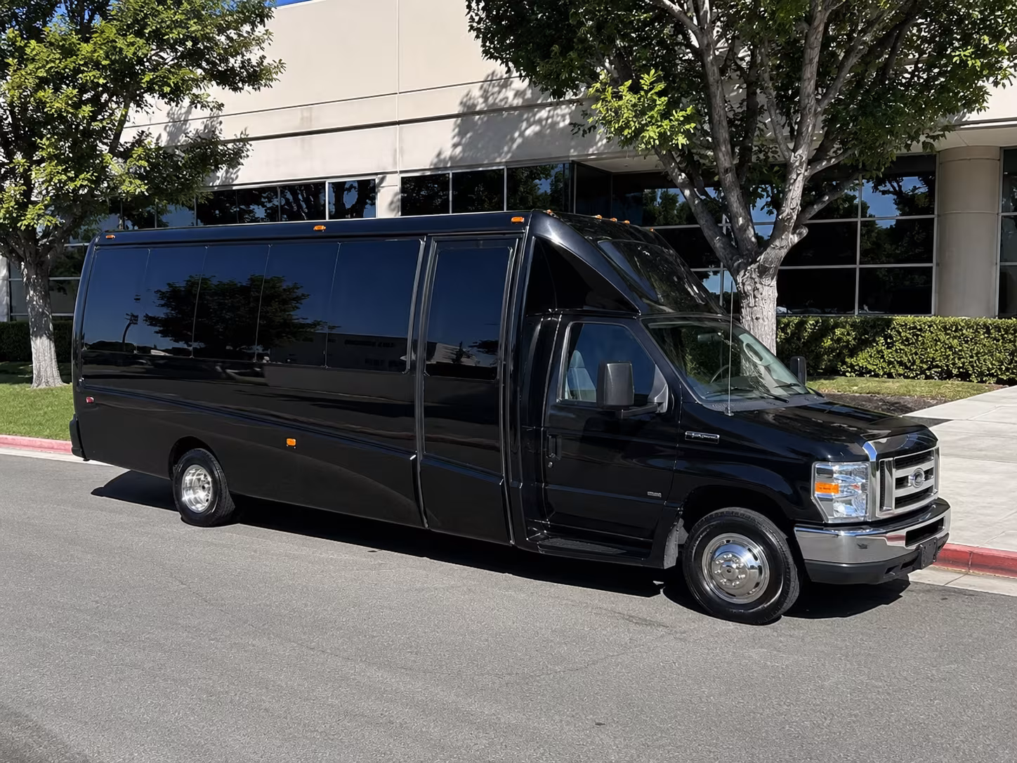 Wedding guests seated inside a party bus serving Houston